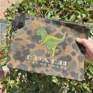EUC Coach Turnlock Pouch With Rexy (68251)